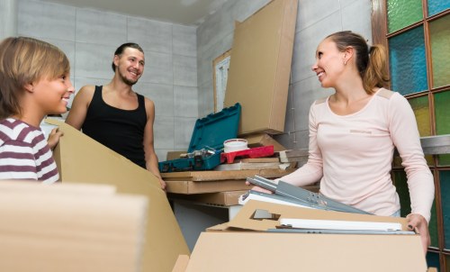 Moving team handling house removals in West Brompton street with local access challenges