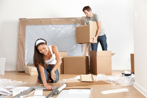 Packed moving boxes and furniture for Westbrompton removals