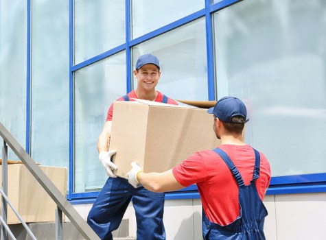 Man and van moving boxes and furniture during a UK removal service