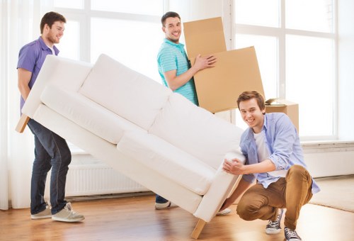 Packed furniture and boxes inside a removal van in Westbrompton