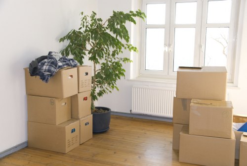 Moving crew in Westbrompton using straps and safety equipment