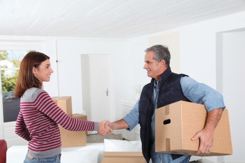 Furniture pick-up service removing bulky sofa items in Westbrompton