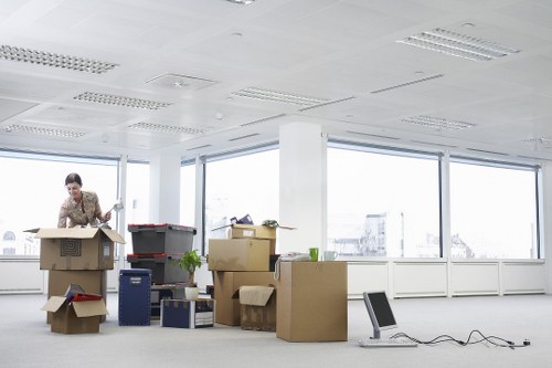 Worker handling furniture carefully during a Westbrompton move