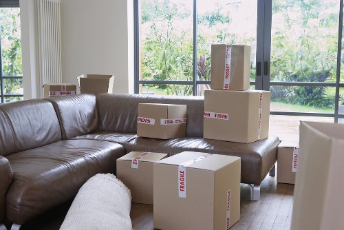 Careful furniture transport through a West Brompton residential street